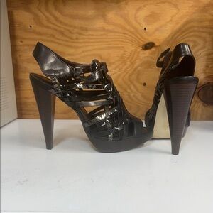 Elegant and sexy dark brown leather high heels by Kurt Geiger